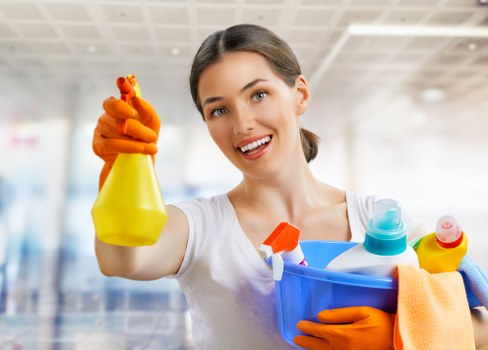 Carpet cleaning technician preparing equipment before service