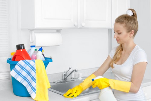 Technician using PPE during carpet cleaning in Totteridge